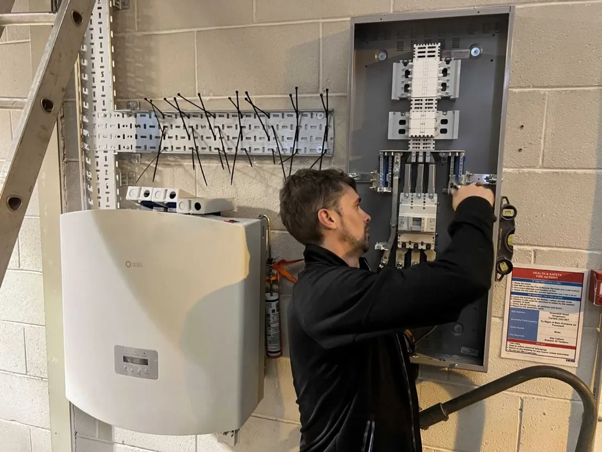 Commercial solar inverter cabinet during O&M inspection